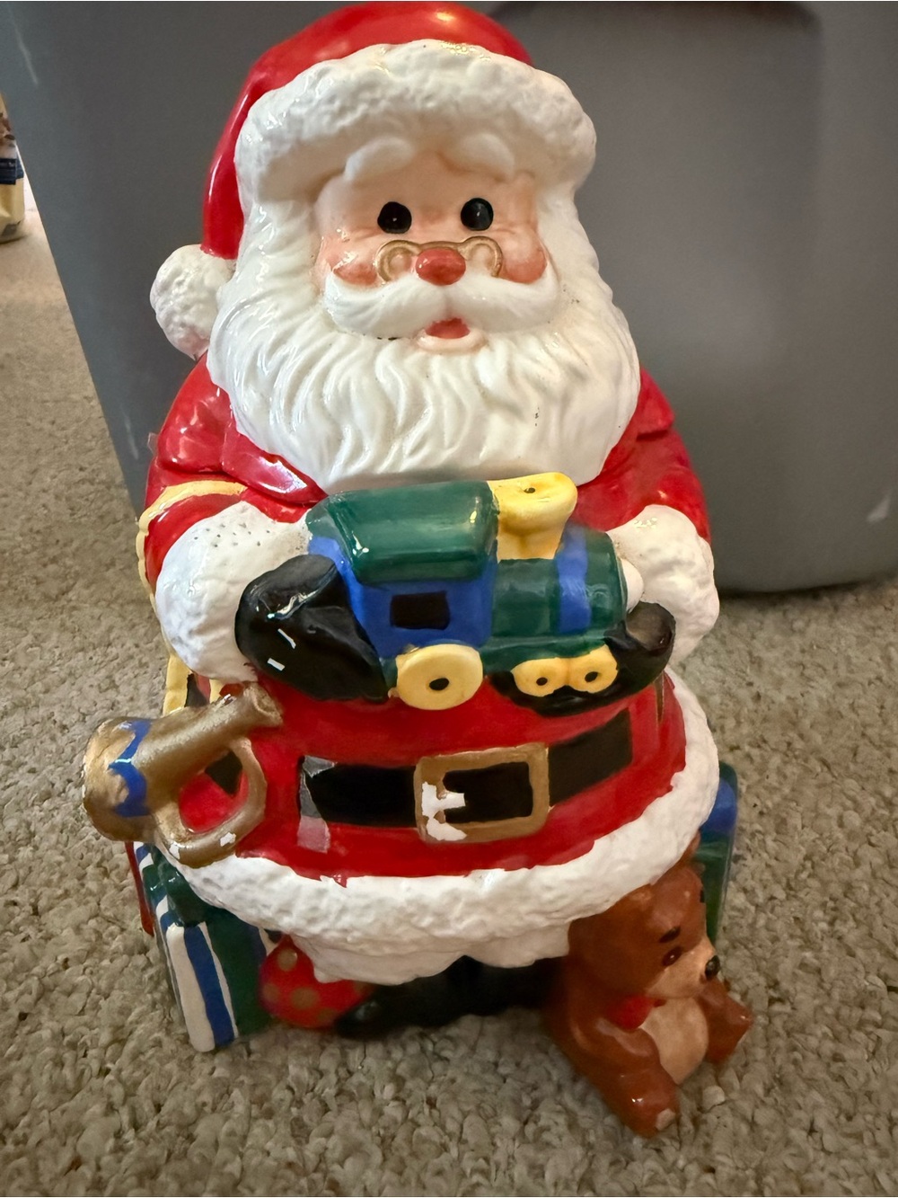 Santa Figurine Holding Toy Train - Red & White Holiday Decor